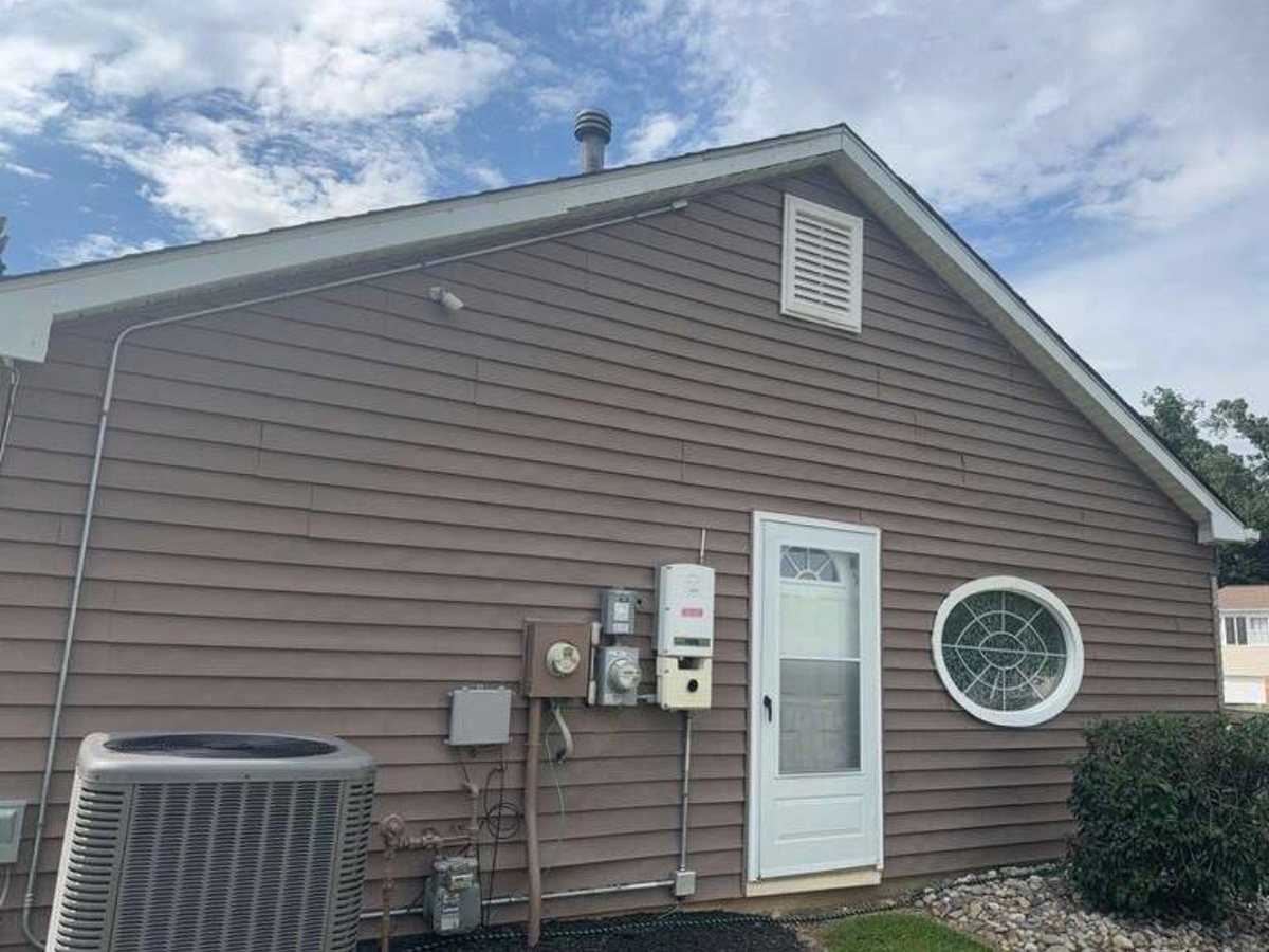 Back gable before siding replacement in Joppa, MD