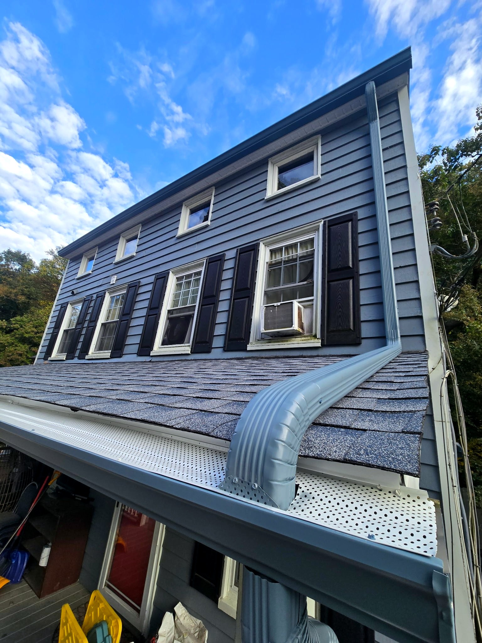 Heritage Blue K-style gutters and downspout on a Port Deposit, MD roof replacement