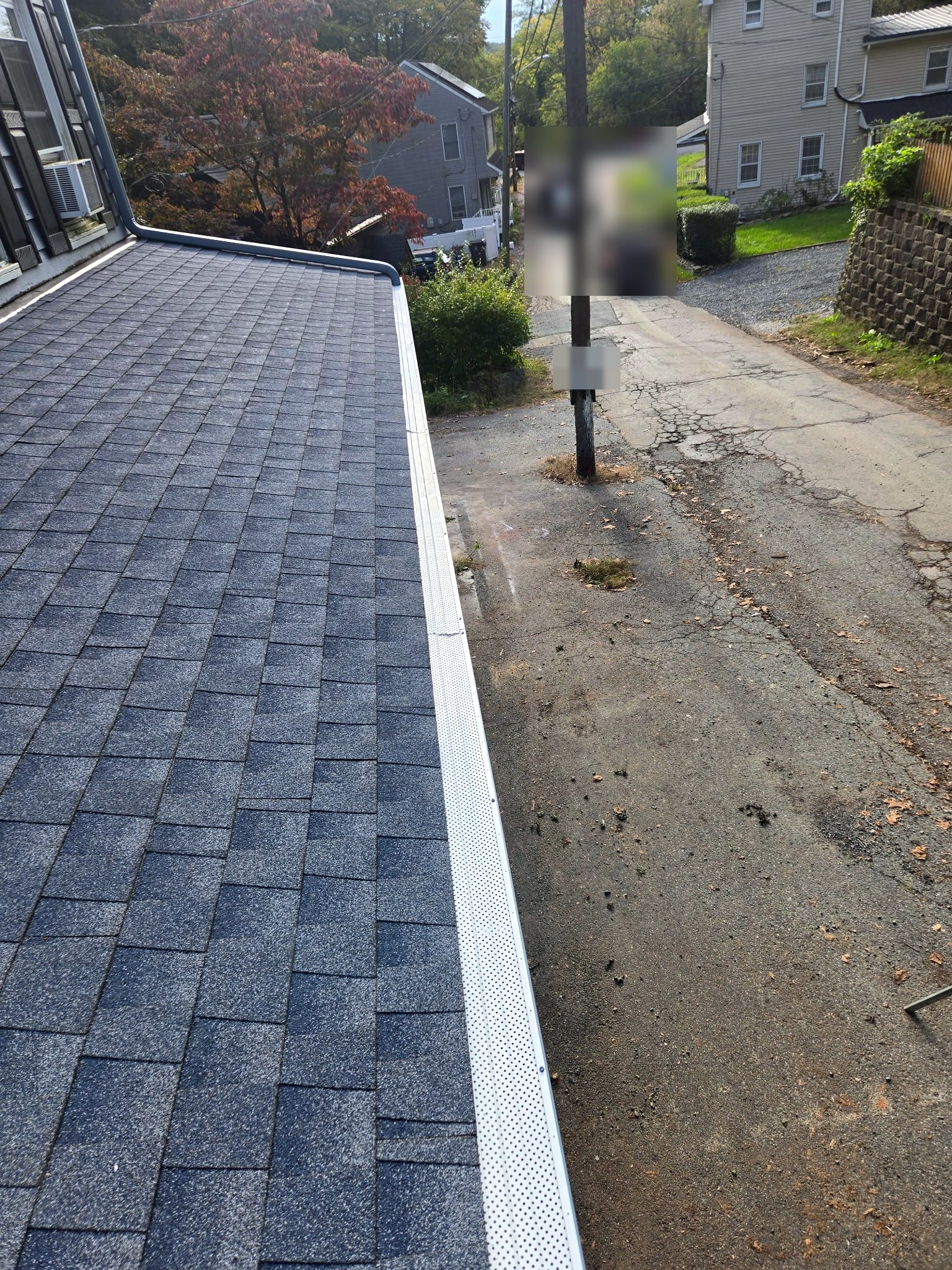 Porch roof with gutter guards after roof replacement in Port Deposit, MD