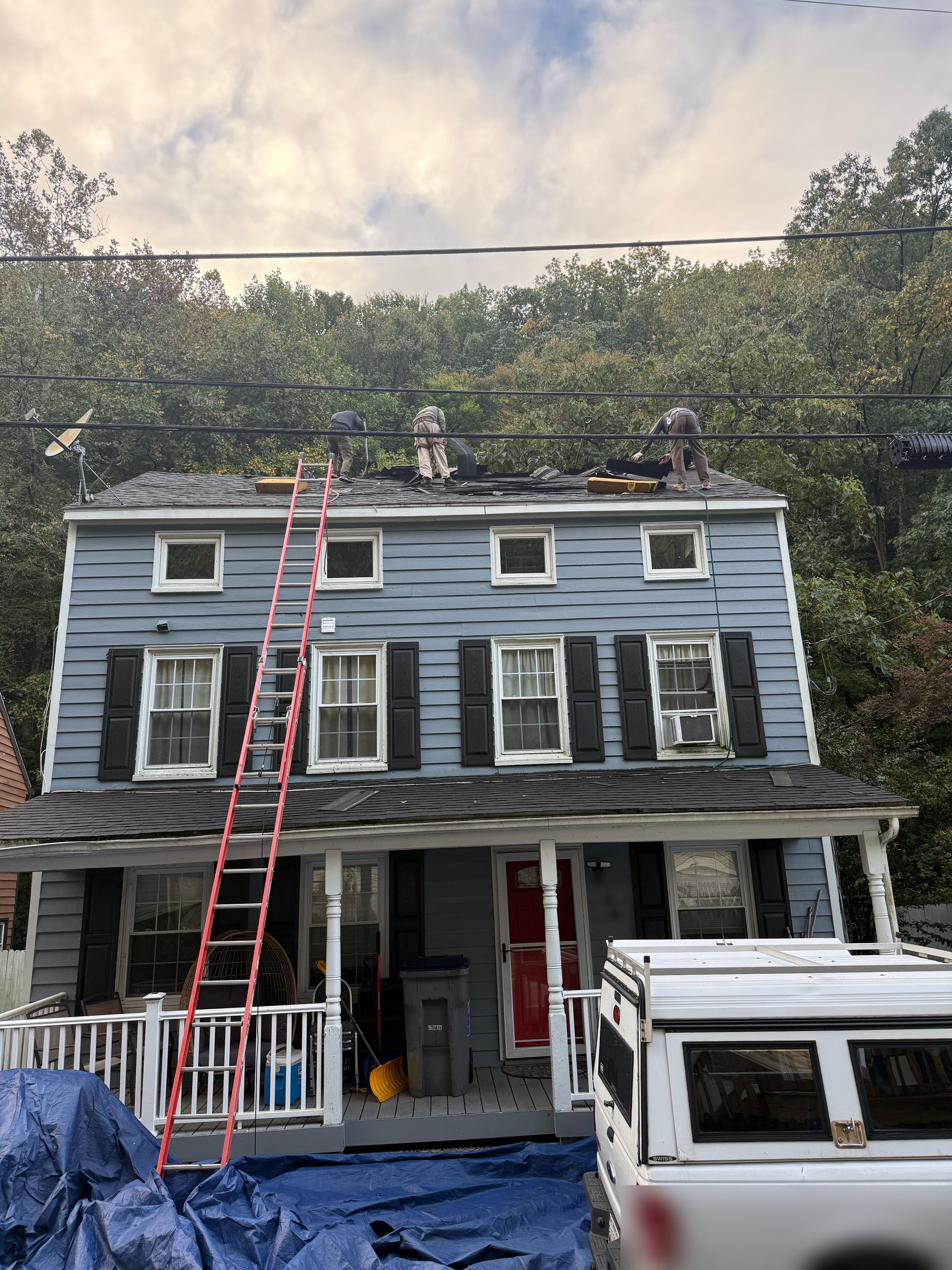 Two-layer roof tear-off during roof replacement in Port Deposit, MD